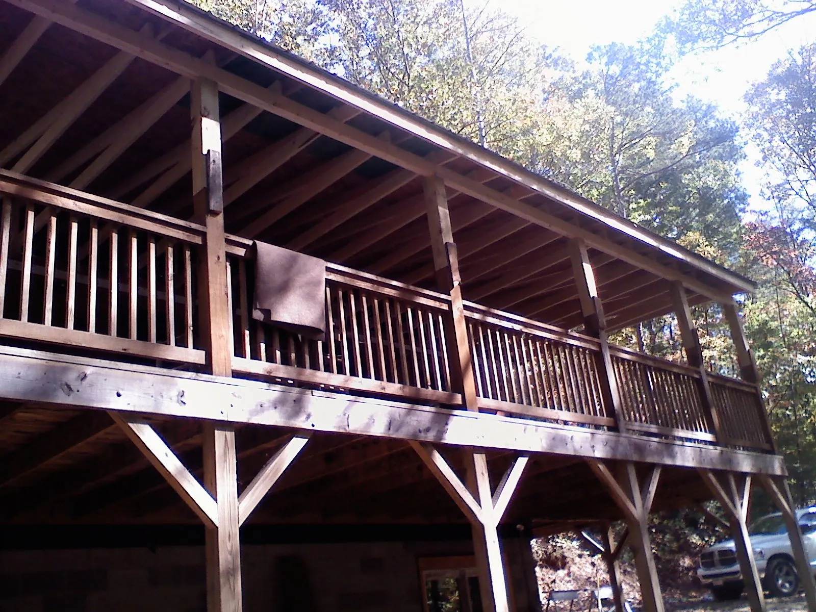 Timber framing under a new elevated porch and deck — Roof Leak Repair in Rockfall by Roofing Brothers
